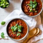 Overhead of 2 bowls of Pumpkin Veggie Stew.