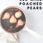 pin saucepan filled with pears and red wine sauce