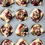 overhead view of puff pastry bites in mini muffin tin