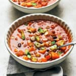 three quarter angle of sweet potato and bean stew with spoon