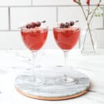 Two glasses of Sparkling Cranberry Mocktail.