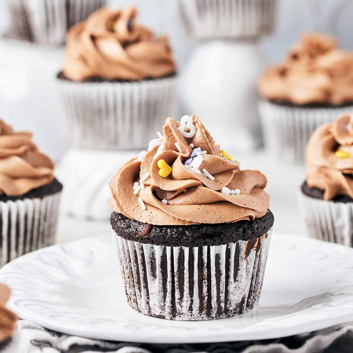 Side view of Vegan Chocolate Fig Cupcakes with Vegan Chocolate Irish Cream Frosting.
