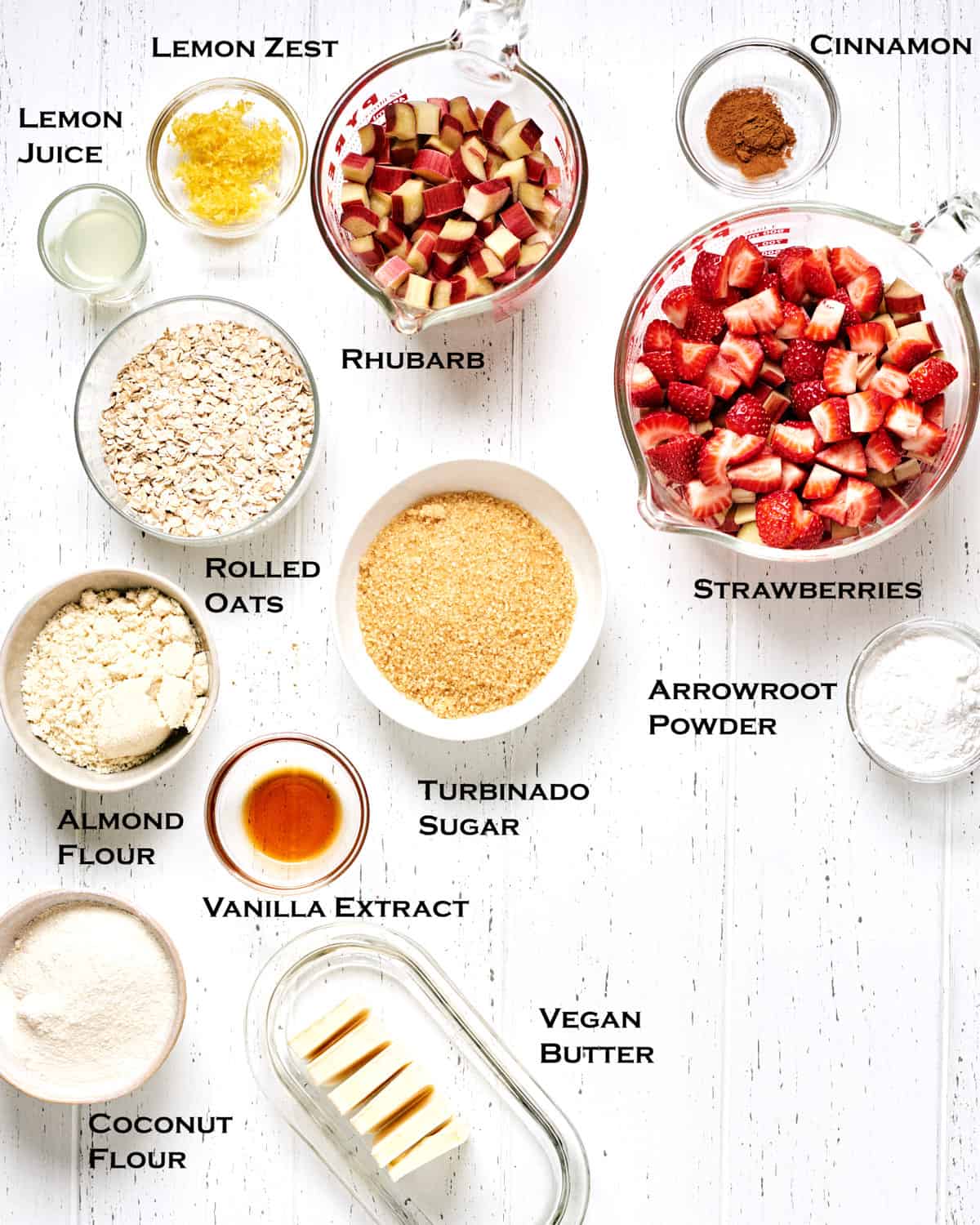 Overhead view of ingredients for Vegan Strawberry Rhubarb Crisp recipe.