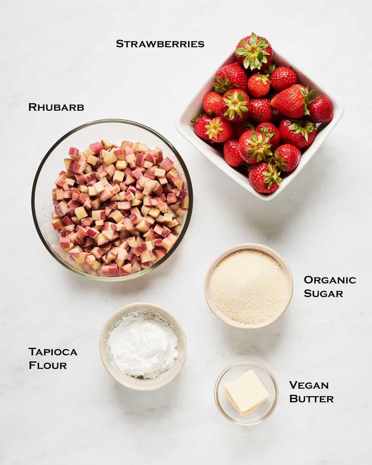 Overhead view of vegan strawberry rhubarb pie ingredients.