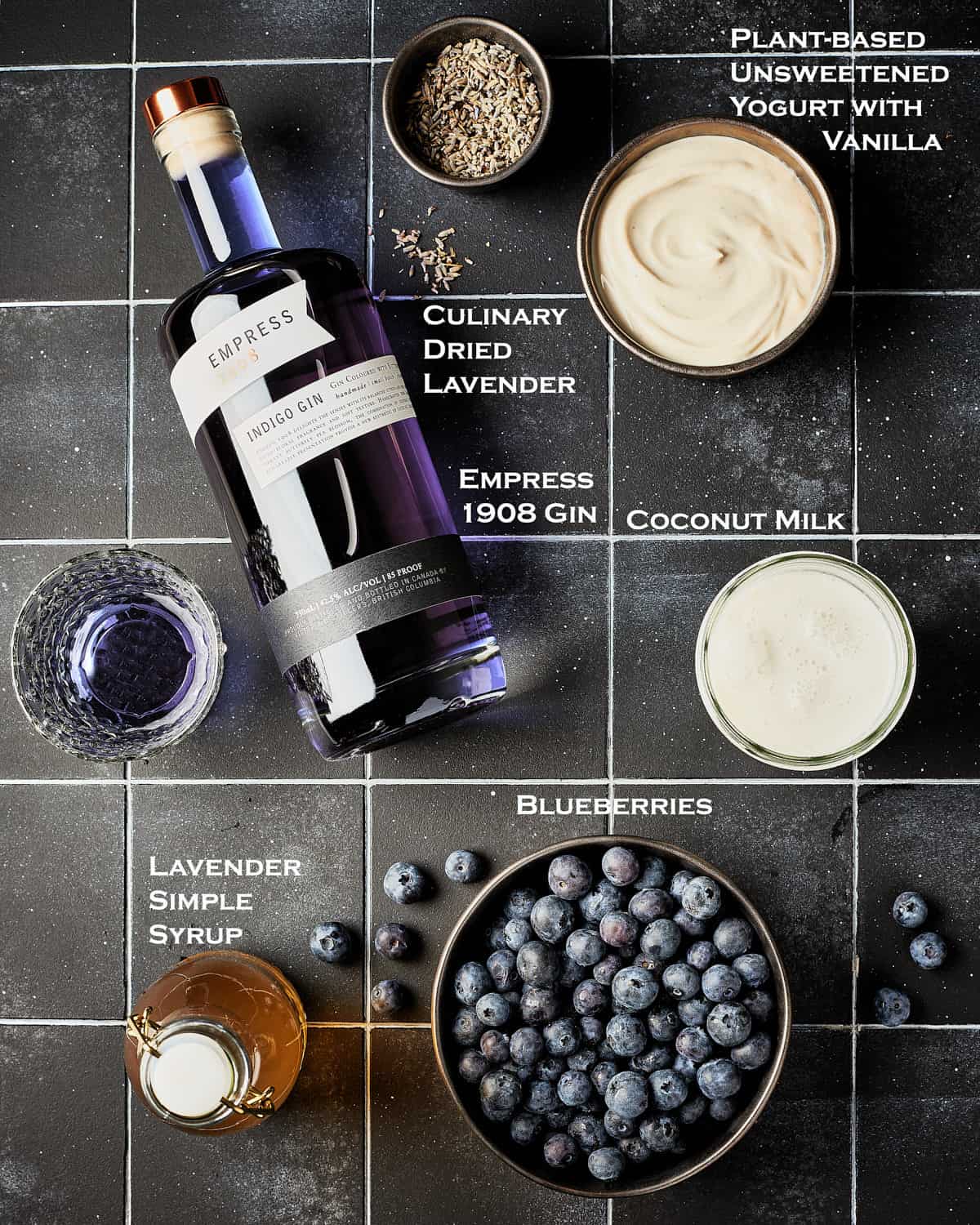 Overhead view of ingredients needed to make Vegan blueberry yogurt gin popsicles.