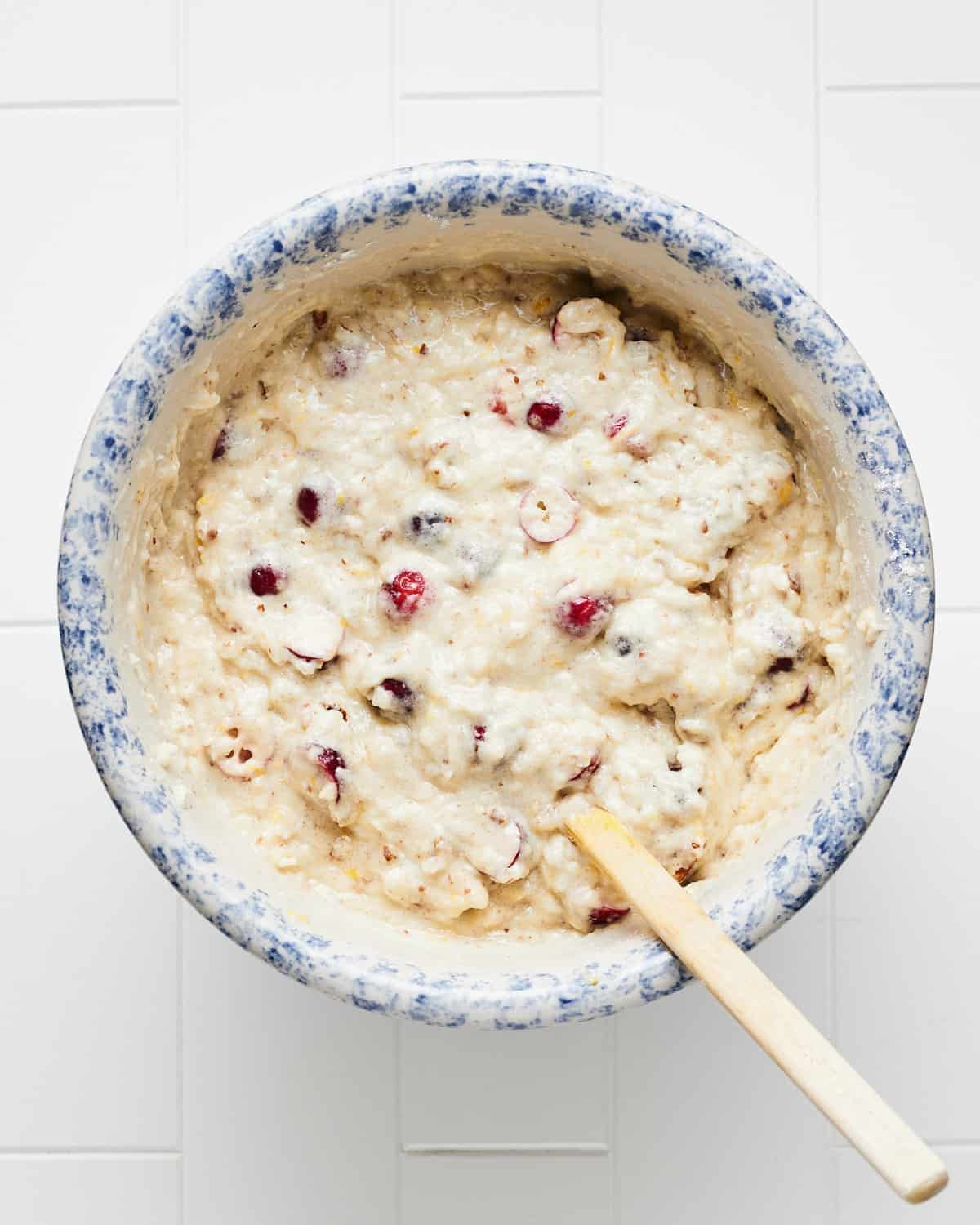 Overhead view of vegan cranberry orange bread batter.