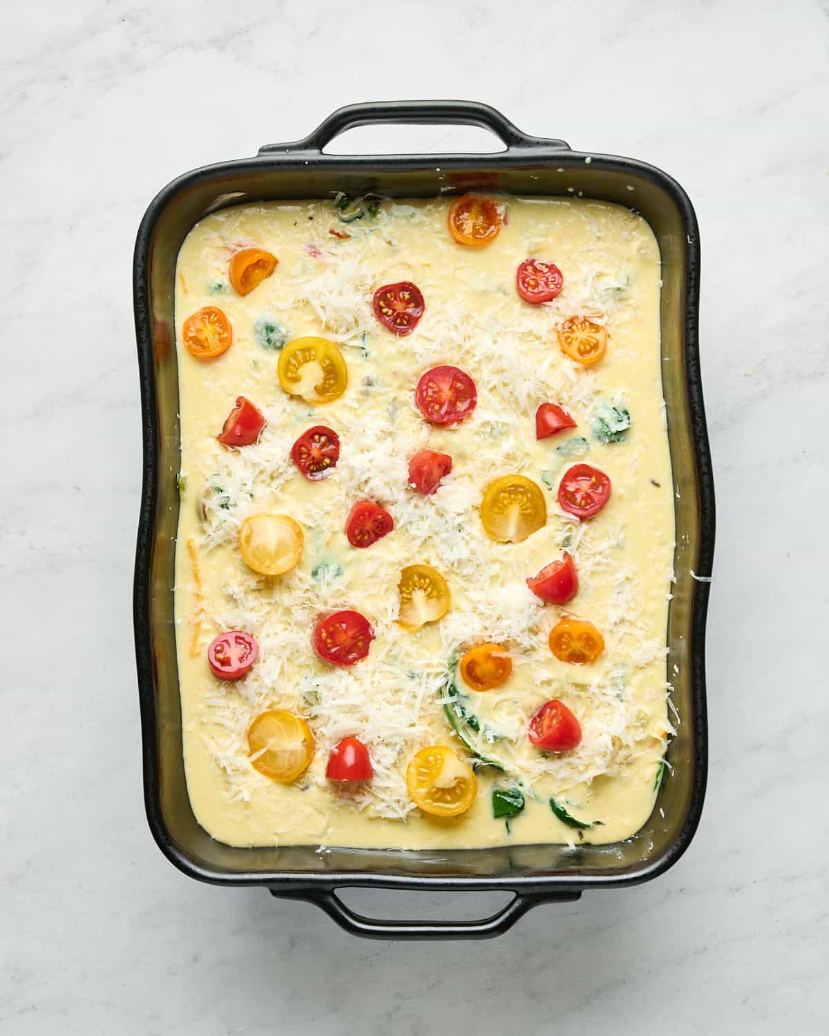 A baking dish with JUST Egg frittata batter before going in oven.