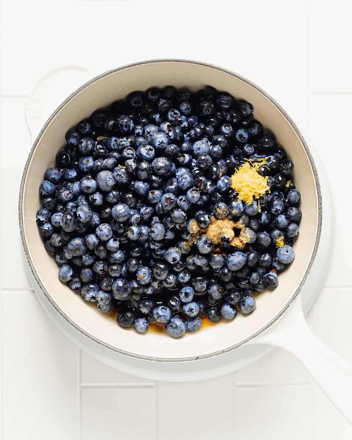Fresh blueberries, lemon zest, water, maple syrup, salt, and ground ginger in a medium saucepan.