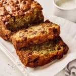 Two cut slices of a loaf of vegan gluten free banana bread.