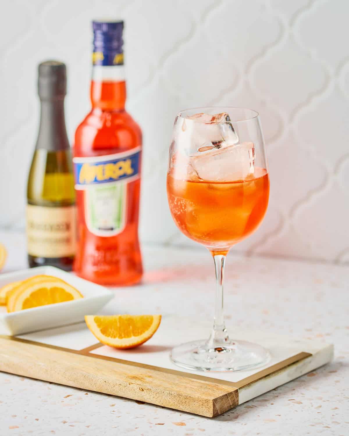 Added Aperol to the Prosecco in a white wine glass with ice.
