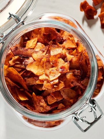 Coconut Bacon in a glass container.