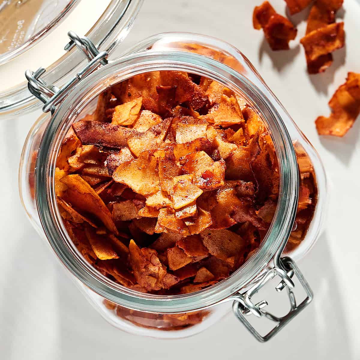 Coconut Bacon in a glass container.