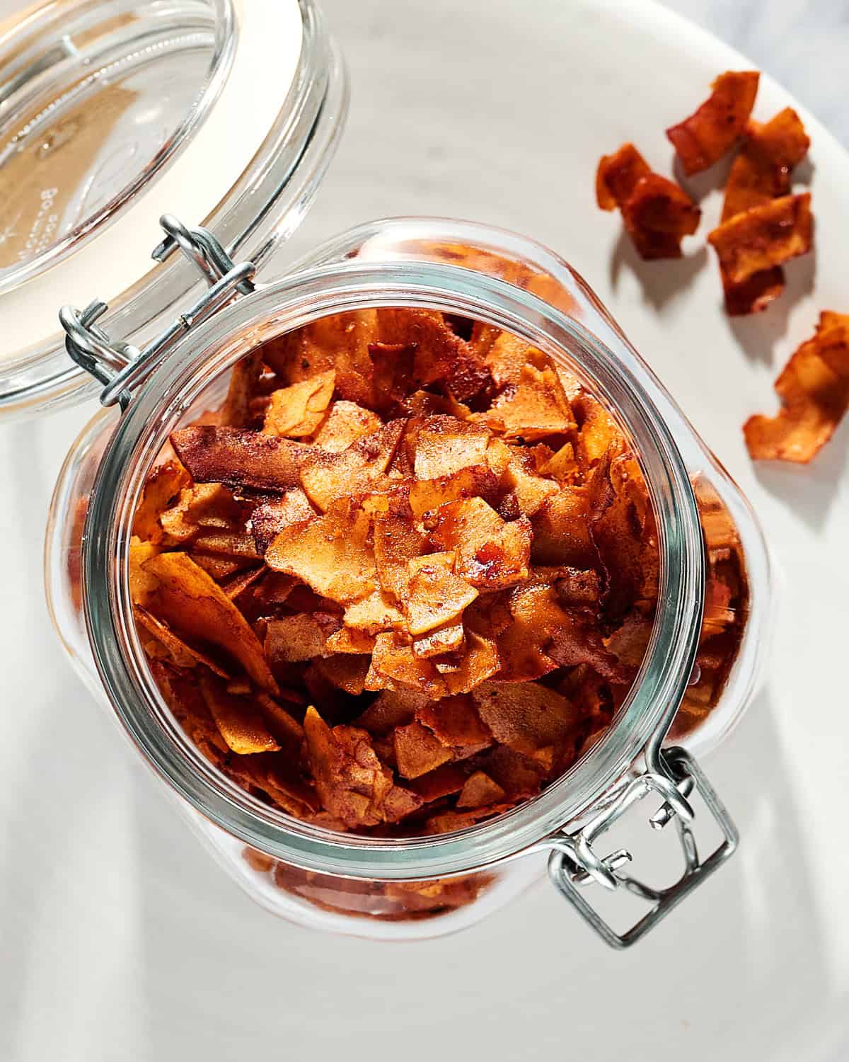Coconut Bacon in a glass container.