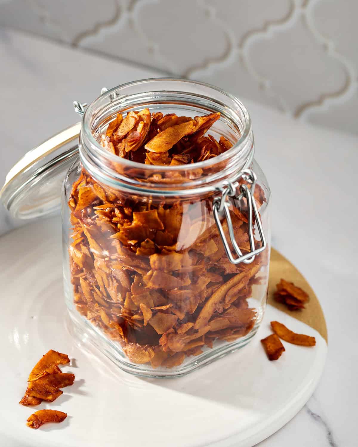 Coconut Bacon in a glass container.