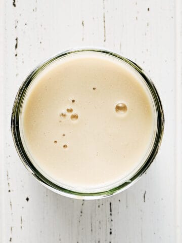 Vegan Buttermilk in a glass jar.