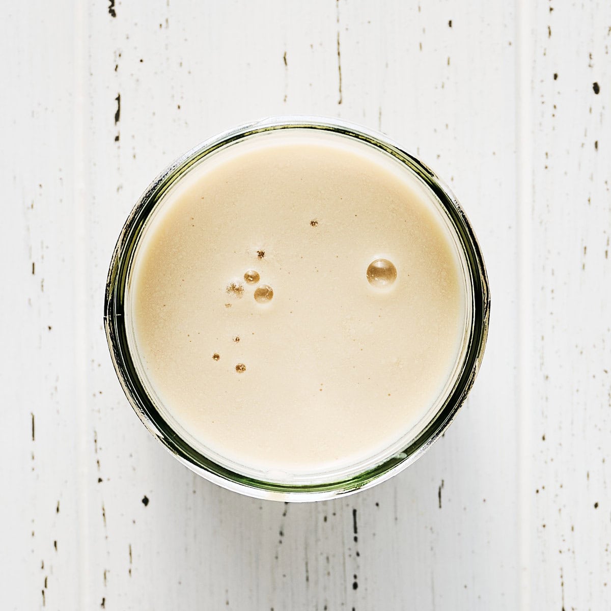 Vegan Buttermilk in a glass jar.