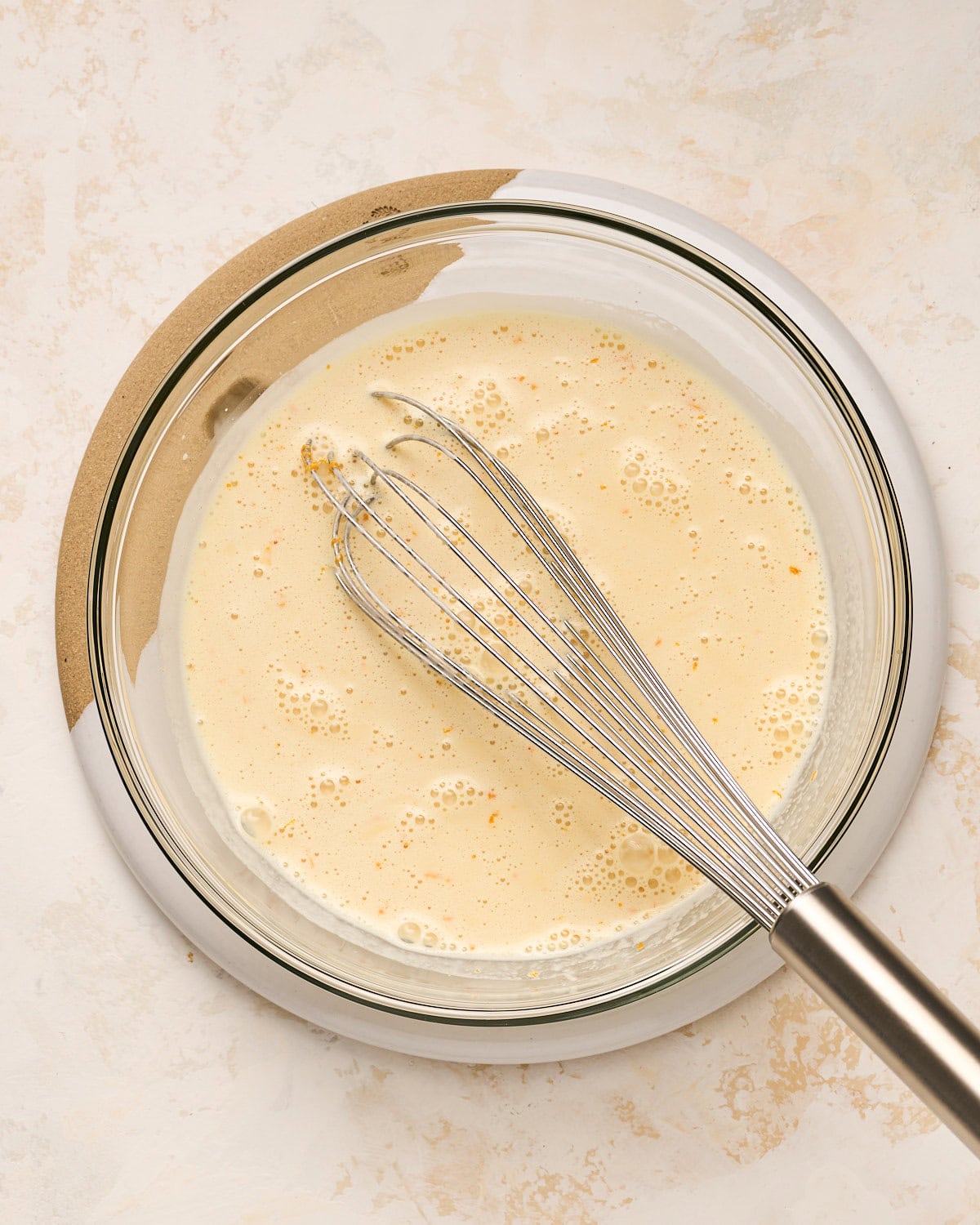 Whisking ingredients to make a vegan custard with JUST Egg for French toast.