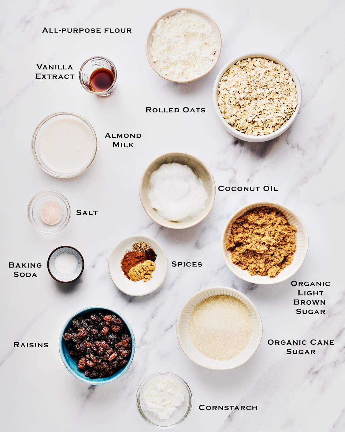 Ingredients to make Vegan Oatmeal Raisin Cookies with Coconut Oil.